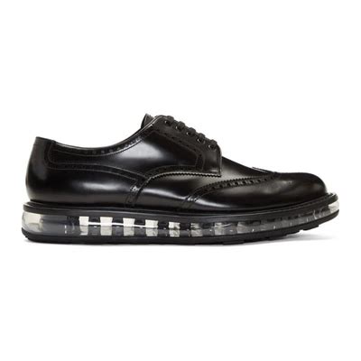 prada levitate burnished-leather wingtip brogues